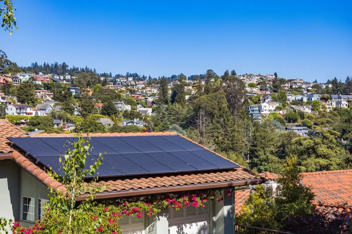 Hips and valleys across a run of rooflines in Bellingham, WA, where two planes meet and hand their water to one line