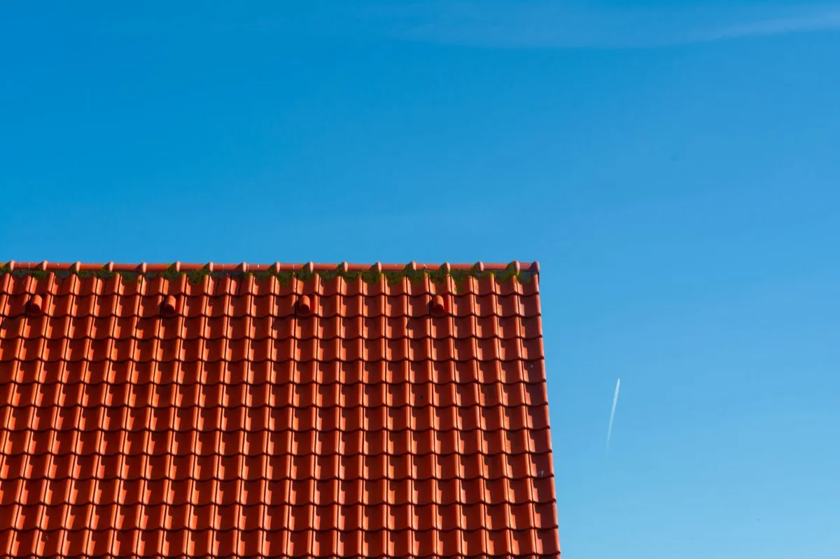 Tile roof gable in full sun, the kind of exposure that sets roof life in Bellingham, WA